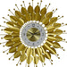 Decorative wall clock with gold leaf-like design on a white background