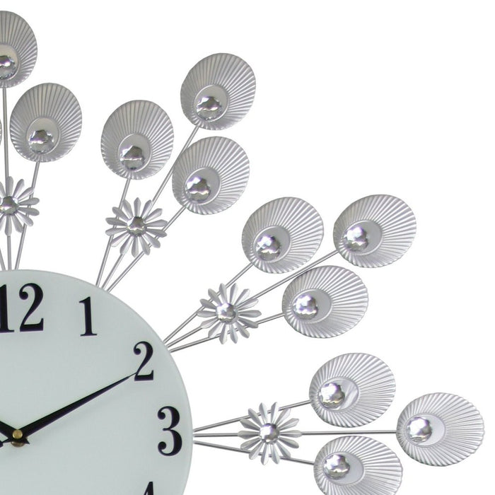 Decorative wall clock with floral design on a white background