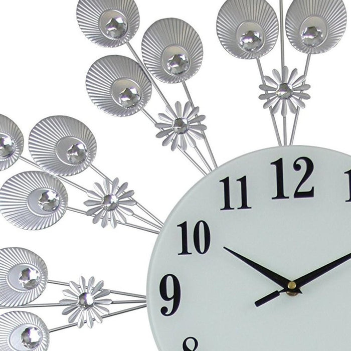Decorative wall clock with floral design and crystal accents