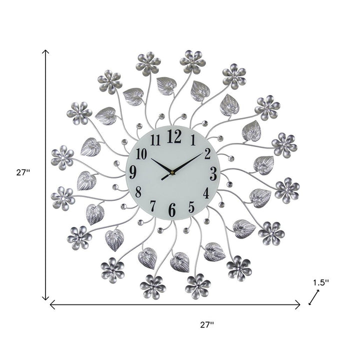 Decorative wall clock with floral design and measurements on a white background