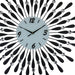 Decorative wall clock with black and silver design on a white background