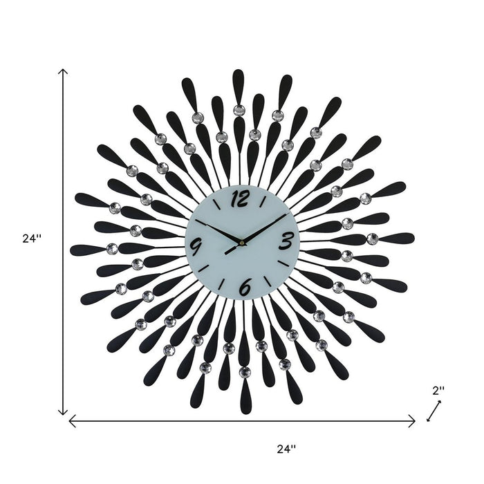 Decorative wall clock with black and silver design, shown with dimensions on a white background.