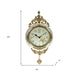 Decorative wall clock with floral design and gold accents, shown with measurements on a white background.
