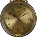 Decorative clock with gold and silver design on a white background