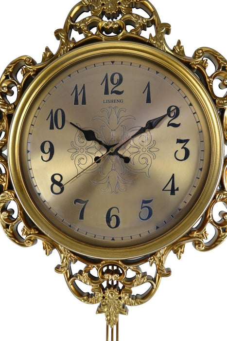 Decorative gold clock with intricate designs on a white background