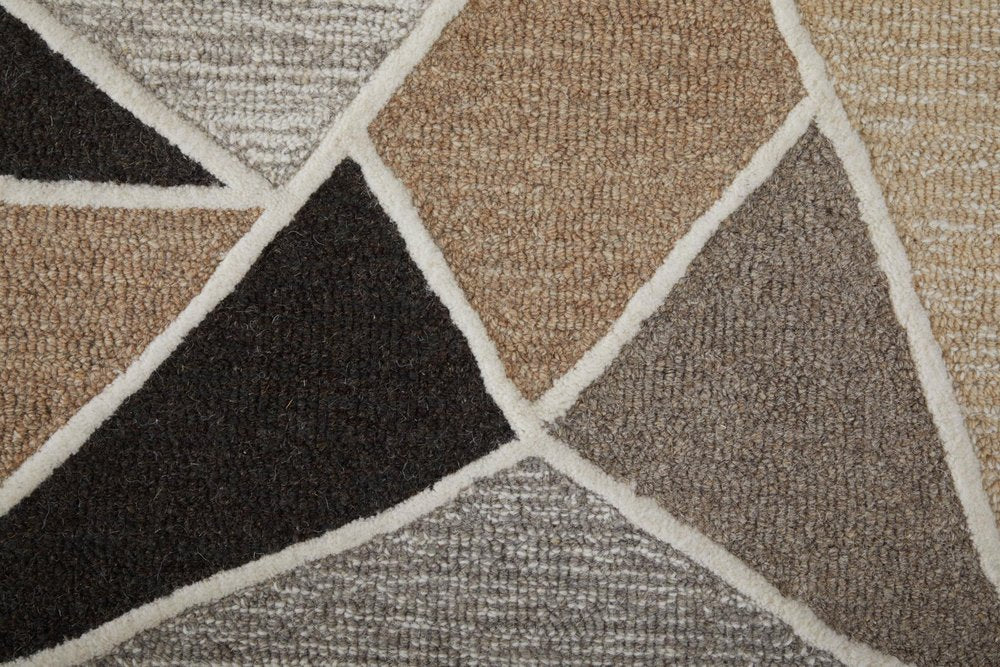 Geometric patterned rug with brown, black, and gray colors