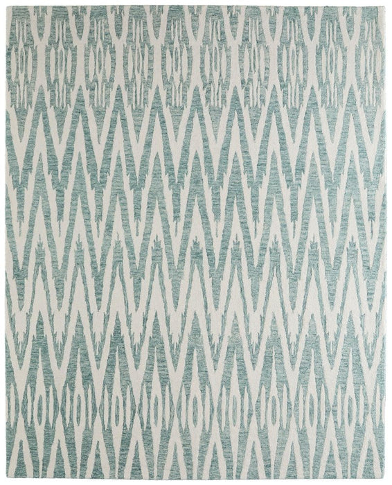 Patterned rug with blue and white zigzag design