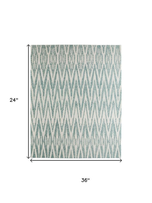 Rug with geometric pattern and dimensions on a white background