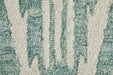 Close-up of textured teal and beige carpet
