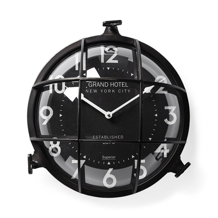 Black wall clock with 'Grand Hotel New York City' branding on a white background