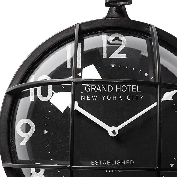 Black clock face with 'Grand Hotel New York City' branding