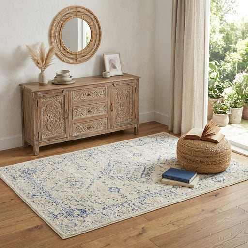 Wooden sideboard with decorative items in a room with a rug and window.