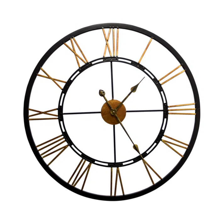 A round, open-frame wall clock featuring a black metal frame and large gold Roman numerals. The Geoghegan Metal Wall Clock by Charlton Home® has two gold hands, showing the time at 10:10. The center of the clock is also gold, matching the numerals and hands, giving it a vintage look that enhances any home decor.